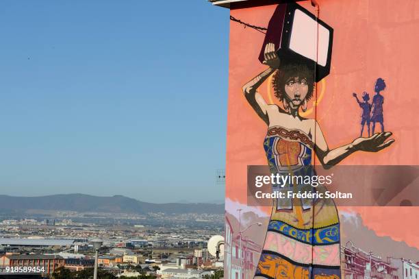 Mural painting and graffitis in Cape Town. Mural painting by South African woman painter Faith 47, who denounces injustices against women and...