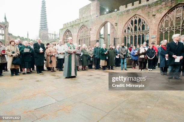 The Cross and Orb on show at Coventry Cathedral during service of reconciliation, Friday 12th February 1999. The 18ft gilded steel and copper cross...