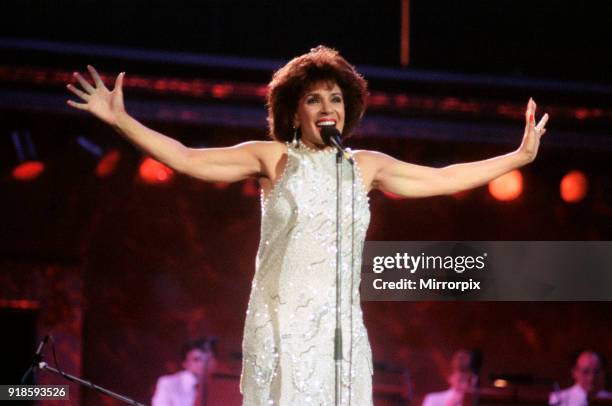 Shirley Bassey performing at the Cor World Choir concert at Cardiff Arms Park, 29th May 1993.