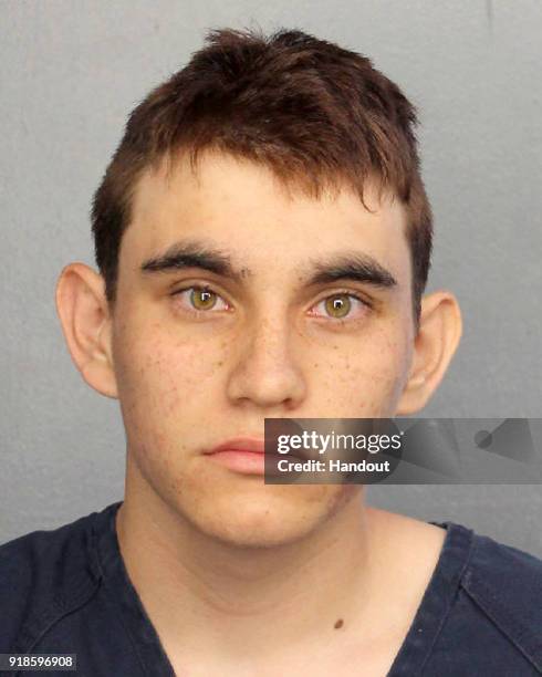 In this handout provided by Broward's Sheriff's Office, suspect Nikolas Cruz poses for a mugshot photo after being arrested February 14, 2017 in...