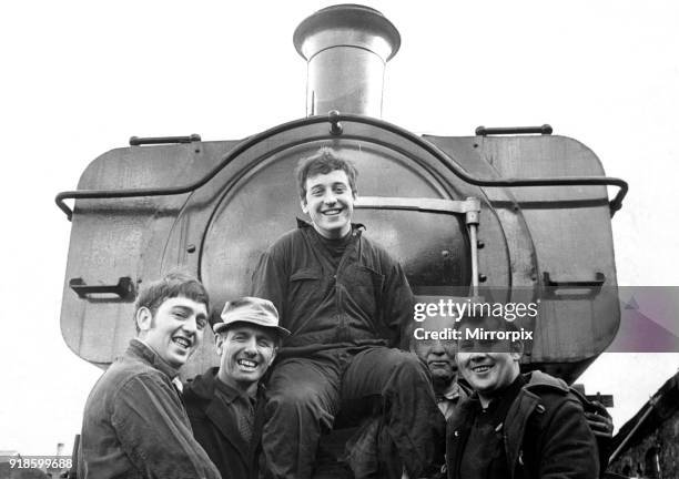 Ray Hopkins, aka Chico, Maesteg Rugby Union Player, and Twickenham hero, is lifted up by workmates at the NCB workshop at Maesteg, 2nd May 1970. Ray...