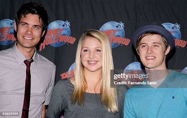 Drew Seeley, Adrian Slade and Lucas Grabeel visit Planet Hollywood on October 13, 2009 in New York City.