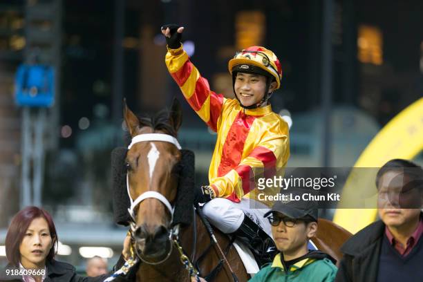 Jockey Dylan Mo Hin-tung riding Happy Friendship wins the Race 1 Rose Handicap at Happy Valley Racecourse on February 14, 2018 in Hong Kong, Hong...
