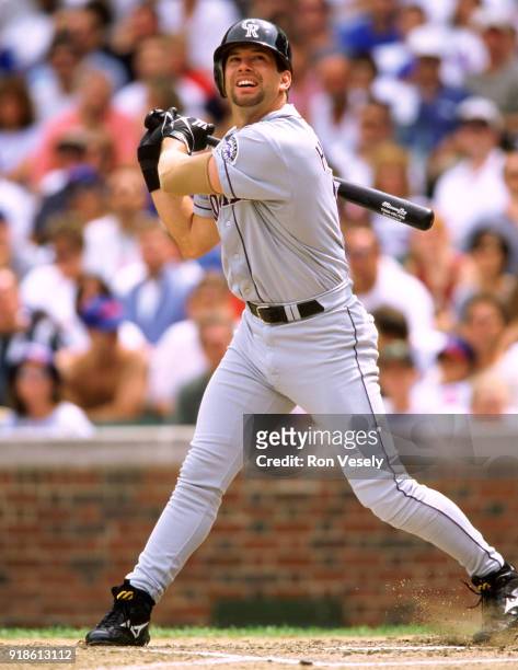 Todd Helton of the Colorado Rockies bats during an MLB game versus the Chicago Cubs at Wrigley Field in Chicago, Illinois during the 1999 season.