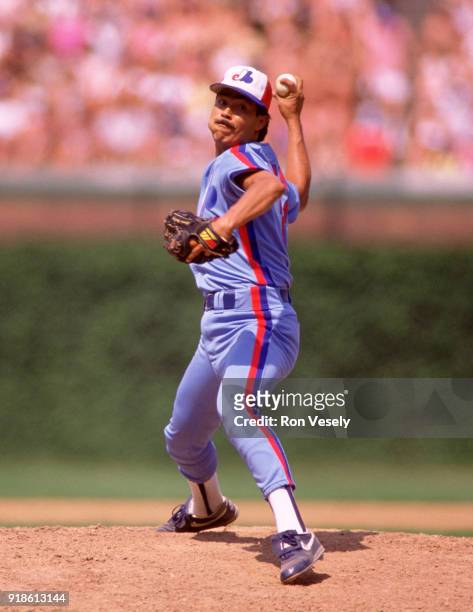 Dennis Martinez of the Montreal Expos pitches during an MLB game versus the Chicago Cubs at Wrigley Field in Chicago, Illinois during the 1988 season.
