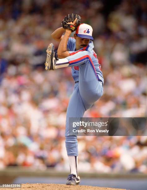 Dennis Martinez of the Montreal Expos pitches during an MLB game versus the Chicago Cubs at Wrigley Field in Chicago, Illinois during the 1988 season.