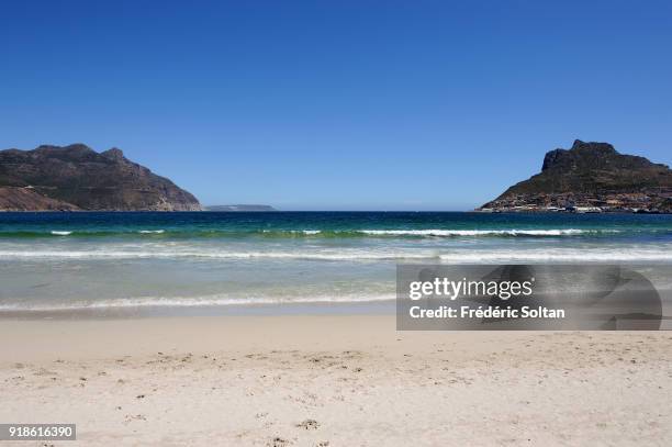 Beach of Hout Bay in Cape Town. Hout Bay is the name of a coastal suburb, seaboard of the Cape Peninsula and twenty kilometres south of Cape Town on...