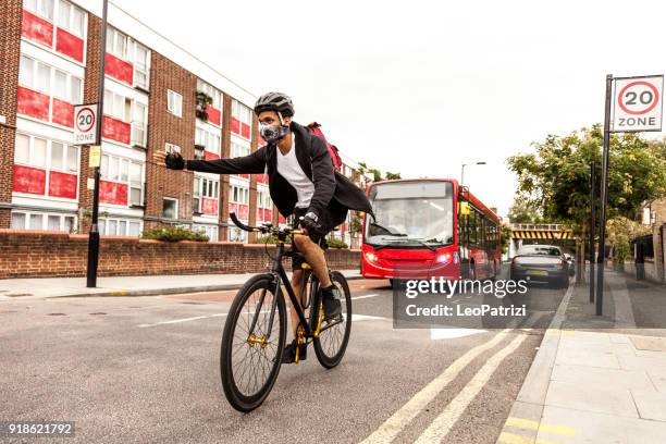 young student in london going to university class - death mask stock pictures, royalty-free photos & images