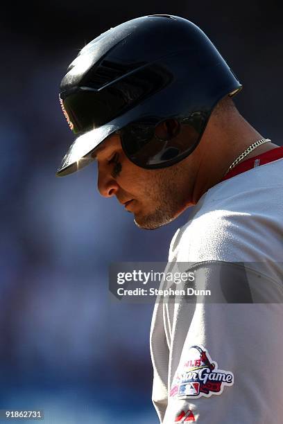 Yadier Molina of the St. Louis Cardinals looks down in Game Two of the NLDS during the 2009 MLB Playoffs against the Los Angeles Dodgers at Dodger...