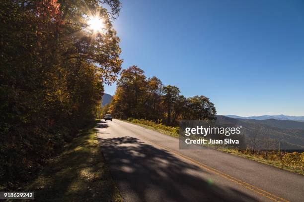 cars driving on blue ridge parkway - pisgah national forest stock pictures, royalty-free photos & images
