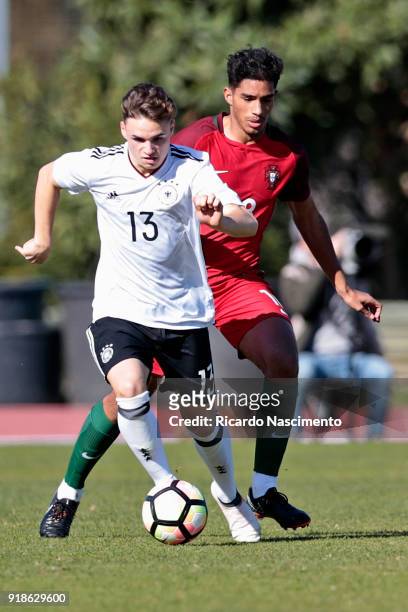 Robin Kolle of Germany U17 challenges Rodrigo Fernandes of Portugal U17 during U17-Juniors Algarve Cup match between U17 Portugal and U17 Germany at...