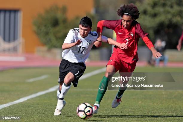 Oliver Bias of Germany U17 challenges Tomas Tavares of Portugal U17 during U17-Juniors Algarve Cup match between U17 Portugal and U17 Germany at Bela...