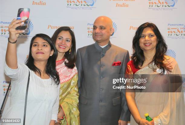 Woman takes a selfie with the Consul General of India Mr. Dinesh Bhatia and his wife Mrs. Seema Bhatia along with Anu Srivastava the Chairperson of...