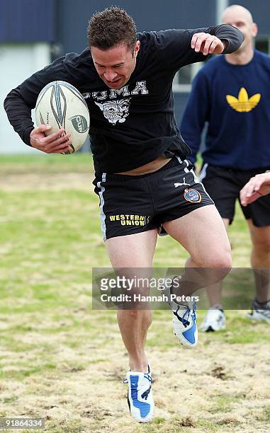 Former New Zealand soccer player Noah Hickey runs through drills during a celebrity Tsunami Relief rugby training session at Unitec on October 14,...