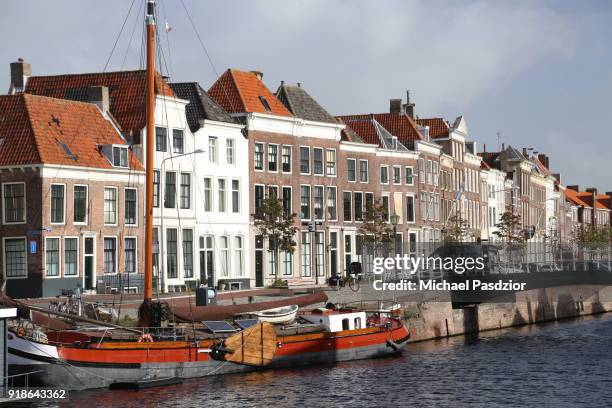 houses at quay in the city - middelburg netherlands stock pictures, royalty-free photos & images