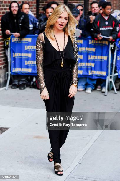 Actress Sienna Miller visits the "Late Show With David Letterman" at the Ed Sullivan Theater on October 13, 2009 in New York City.