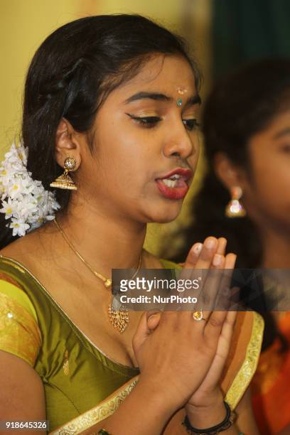 Tamil Hindu girls sing prayers honouring Lord Shiva during the Maha Shivratri festival at a Tamil Hindu temple in Ontario, Canada, on February 13,...
