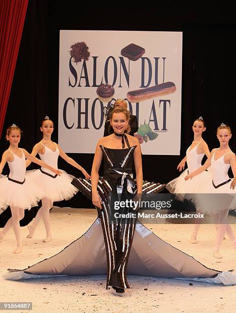 Claire Borotra displays a chocolate decorated dress during the Chocolate dress fashion show celebrating Salon Du Chocolat 15th Anniversary - Opening...