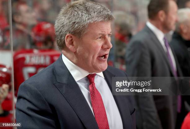 Head coach Bill Peters of the Carolina Hurricanes gives instruction from the bench area during an NHL game against the Colorado Avalance on February...