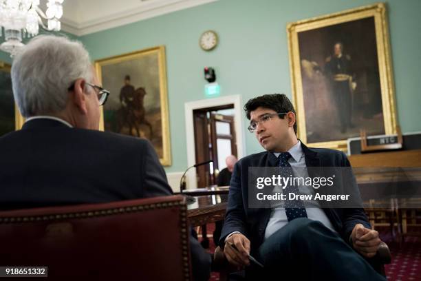 New York City council member Robert F. Holden speaks with New York City Council member and chairman of the Committee on Immigration Carlos Menchaca...