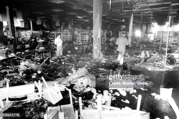Booths destroyed by a 3-alarm fire at the Boston Gift Show on the second floor of the Hynes Auditorium in Boston are pictured on Sep. 16, 1982.