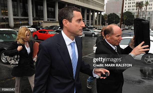 Howard K. Stern leaves the Los Angeles Superior Court with his legal team after the first day of a preliminary hearing into the death of 39-year-old...
