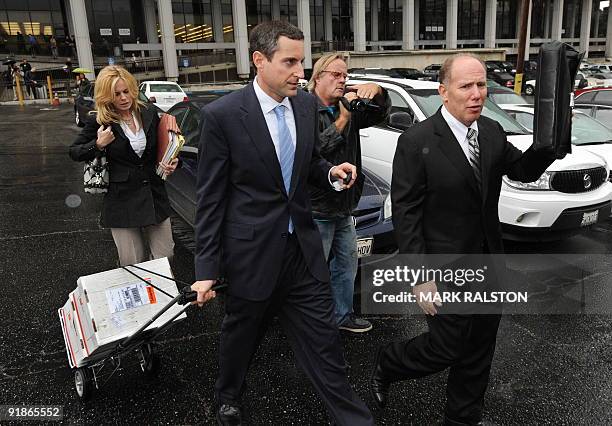 Howard K. Stern leaves the Los Angeles Superior Court with his legal team after the first day of a preliminary hearing into the death of 39-year-old...