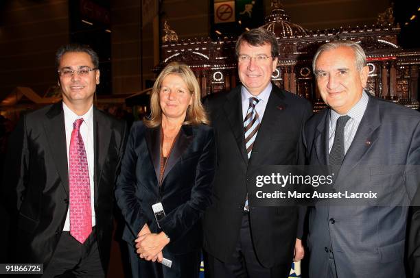 Sylvie Douce and Xavier Darcos and Jean-Pierre Raffarin attend the Salon Du Chocolat 15th Anniversary - Opening Night at the Porte Versailles on...