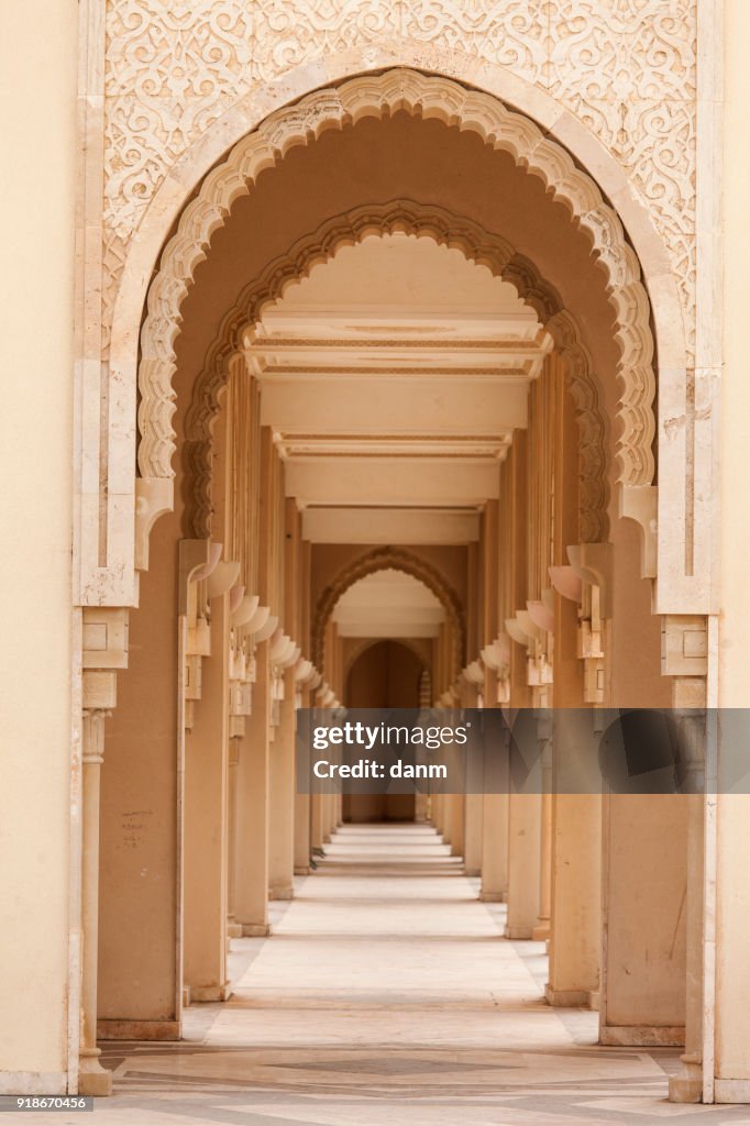 Casablanca, Morocco: Intricate exterior marble and mosaic stone archway outside of Hassan II Mosque in Casablanca, Morocco.