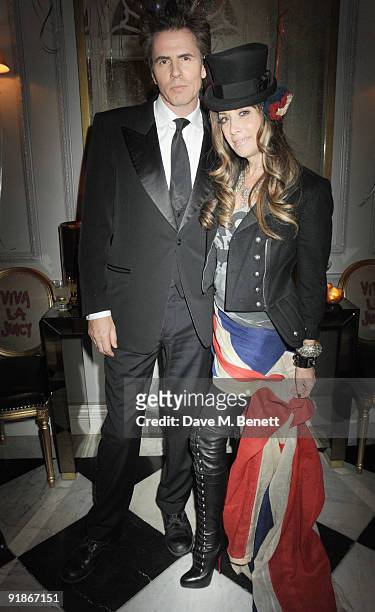 John Taylor and Gela Nash-Taylor attend the Juicy Couture VIP launch party on October 13, 2009 in London, England.