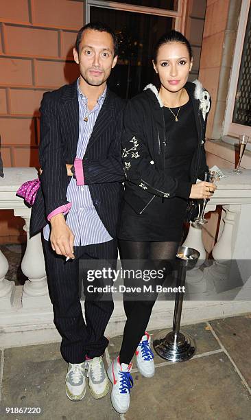 Dan McMillan and partner attend the Damien Hirst VIP dinner on October 13, 2009 in London, England.