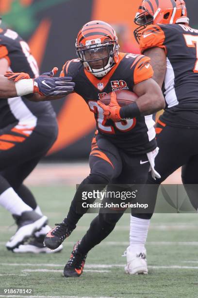 Giovani Bernard of the Cincinnati Bengals runs the football upfield during the game against the Chicago Bears at Paul Brown Stadium on December 10,...