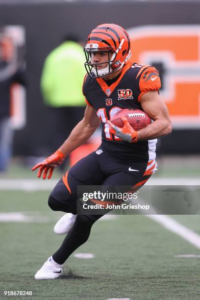 Alex Erickson of the Cincinnati Bengals runs the football upfield during the game against the Chicago Bears at Paul Brown Stadium on December 10,...