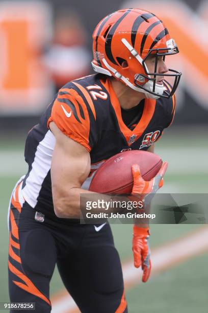 Alex Erickson of the Cincinnati Bengals runs the football upfield during the game against the Chicago Bears at Paul Brown Stadium on December 10,...