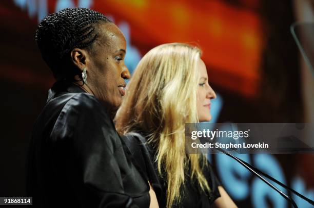 Olympic runner Jackie Joyner-Kersee and athlete Aimee Mullins speak onstage during the 30th Annual Salute To Women In Sports Awards at The...