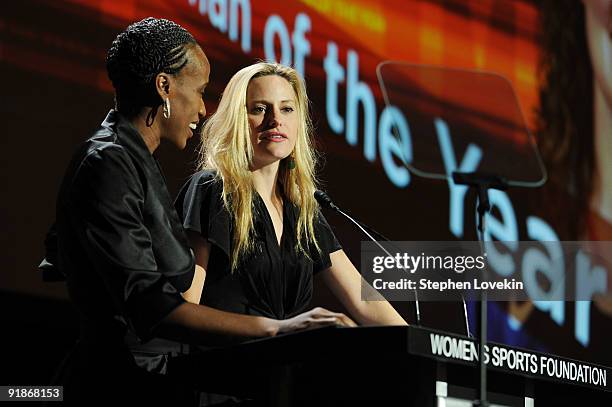 Olympic runner Jackie Joyner-Kersee and athlete Aimee Mullins speak onstage during the 30th Annual Salute To Women In Sports Awards at The...