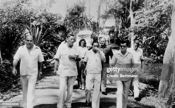 Omar Torrijos, 2nd from left, after visiting former Shah in this tropical island. From left, Gabriel Lewis, owner of the two houses where the Shah...