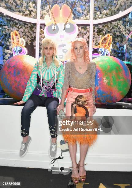 Fashion designer Katie Eary poses with a model at her Skate Park presentation during London Fashion Week February 2018 on February 15, 2018 in...