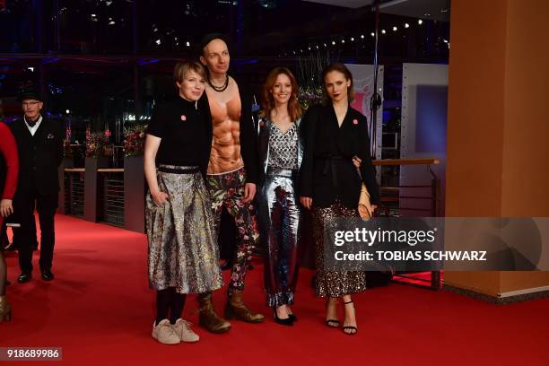 Anna Brueggemann and her brother Dietrich Brueggemann pose with German actress Lavinia Wilson and Sina Tkotsch on the red carpet upon their arrival...