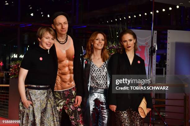 Anna Brueggemann and her brother Dietrich Brueggemann pose with German actress Lavinia Wilson and Sina Tkotsch on the red carpet upon their arrival...
