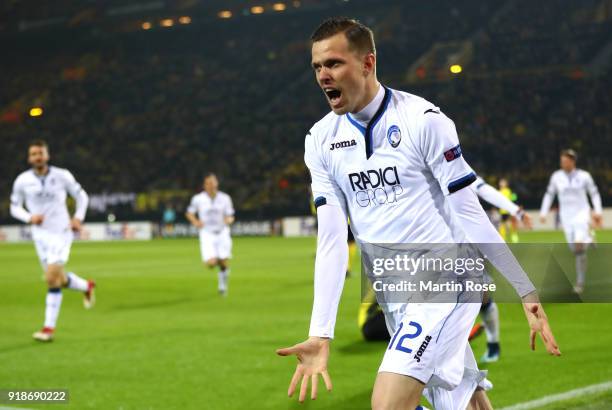 Josip Ilicic of Atalanta celebrates scoring the first Atalanta goal during UEFA Europa League Round of 32 match between Borussia Dortmund and...