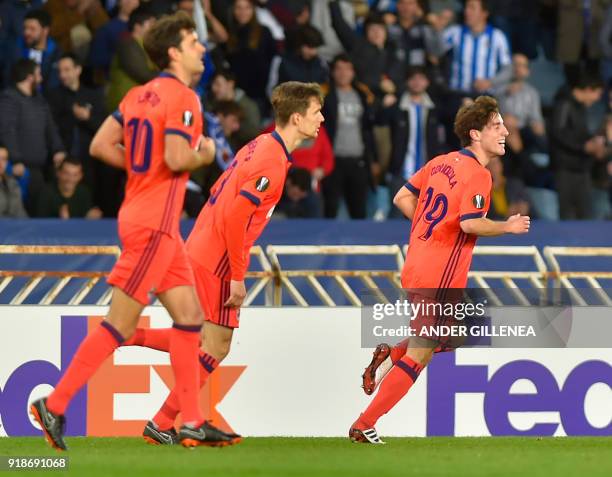 Real Sociedad's Spanish defender Alvaro Odriozola celebrates scoring a goal during the UEFA Europa League first leg round of 32 football match...