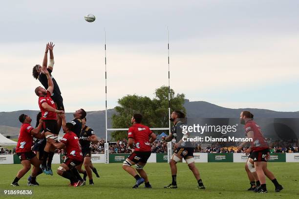 Tom Franklin of the Highlanders and Luke Romano of the Crusaders compete for the lineout ball during the Super Rugby trial match between the...