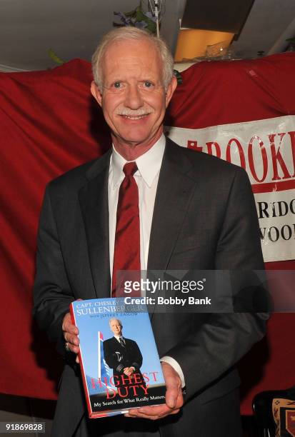 Captain Chesley Sullenberger attends a signing session to promote his book "Highest Duty" at Bookends on October 13, 2009 in Ridgewood, New Jersey.