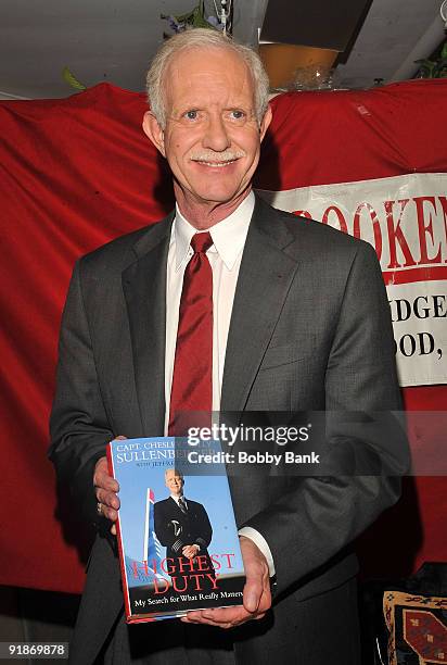 Captain Chesley Sullenberger attends a signing session to promote his book "Highest Duty" at Bookends on October 13, 2009 in Ridgewood, New Jersey.