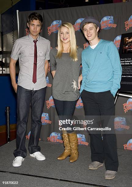 Drew Seeley, Adrian Slade and Lucas Grabeel visit Planet Hollywood on October 13, 2009 in New York City.