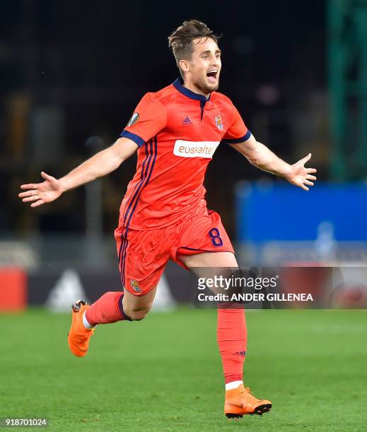 Real Sociedad's Belgian midfielder Adnan Januzaj celebrates after scoring his team's second goal during the UEFA Europa League first leg round of 32...