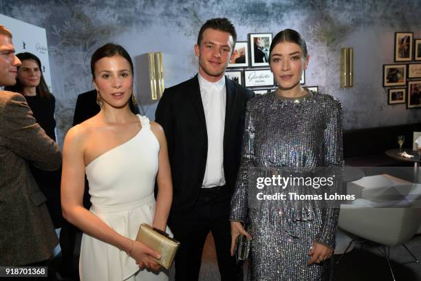 Aylin Tezel, Jannis Niewoehner and Anna Bederke attend the Glashuette Original Lounge at The 68th Berlinale International Film Festival at Grand...