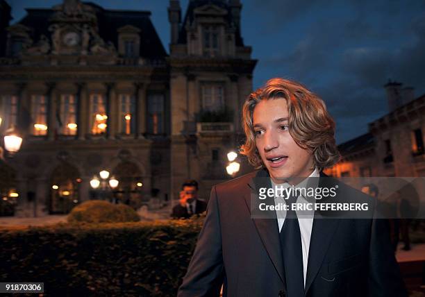 Jean Sarkozy, French President Nicolas Sarkozy's son talks with people in front of the city hall in Neuilly-sur-Seine, outside Paris, on September 10...