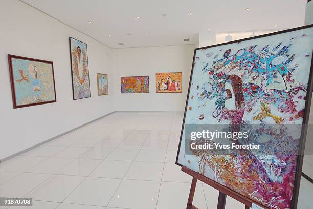 Paintings of artist Akmal Nur are displayed at the Center of National Arts on October 13, 2009 in Tashkent, Uzbekistan.